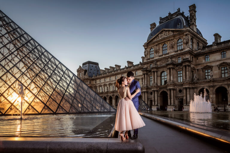 Couple photographed at the Louvre in Paris at sunset