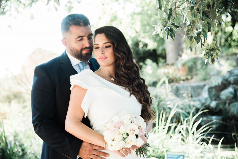Couple in a park after their Marylebone Town Hall wedding