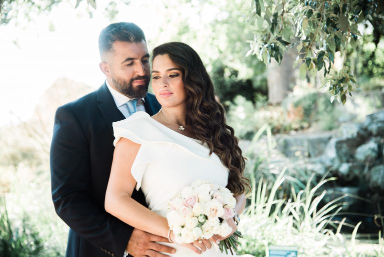Syrus and Bibi photographed together in a London park after their Old Marylebone Town Hall ceremony