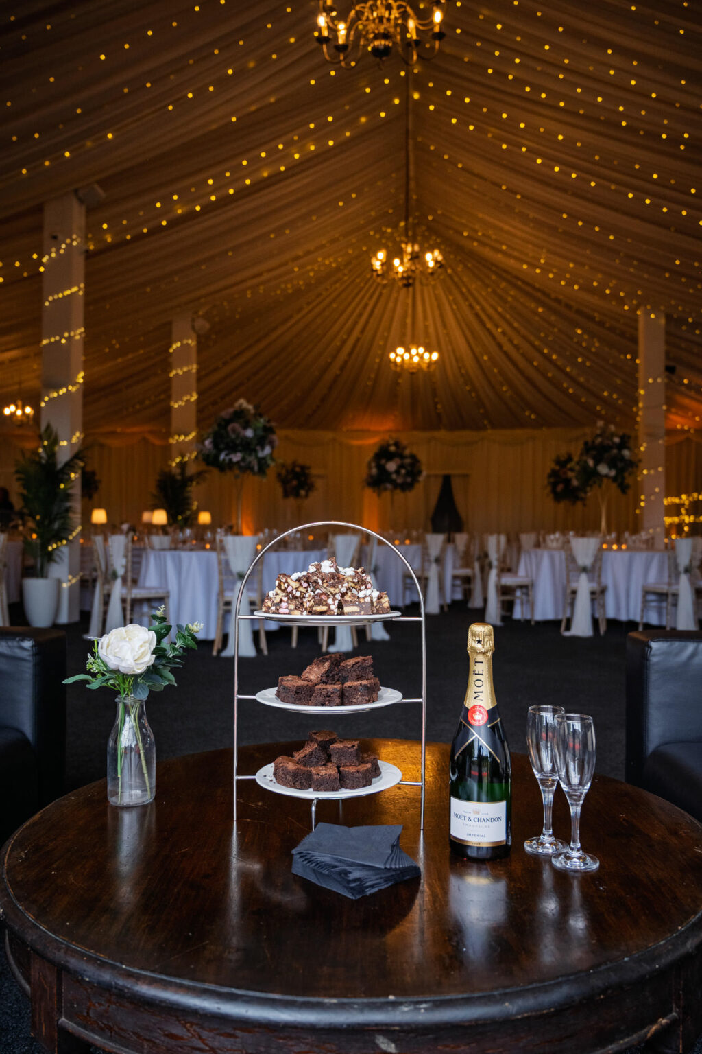 Barn set for a candlelit wedding dinner at Selden Barns