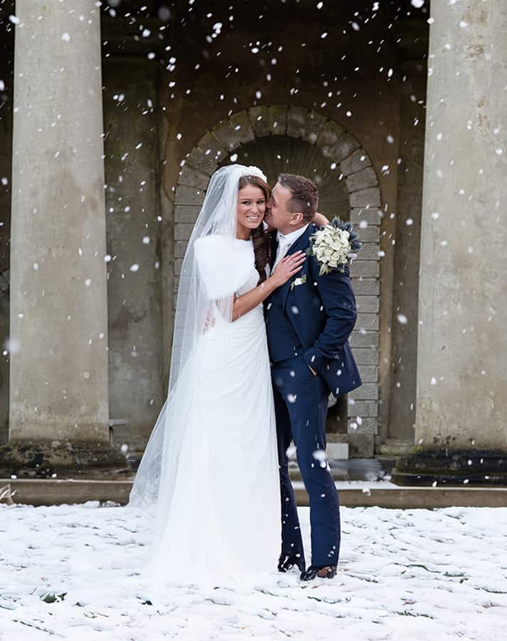 winter-wedding-wotton-house-snow-bride-and-groom