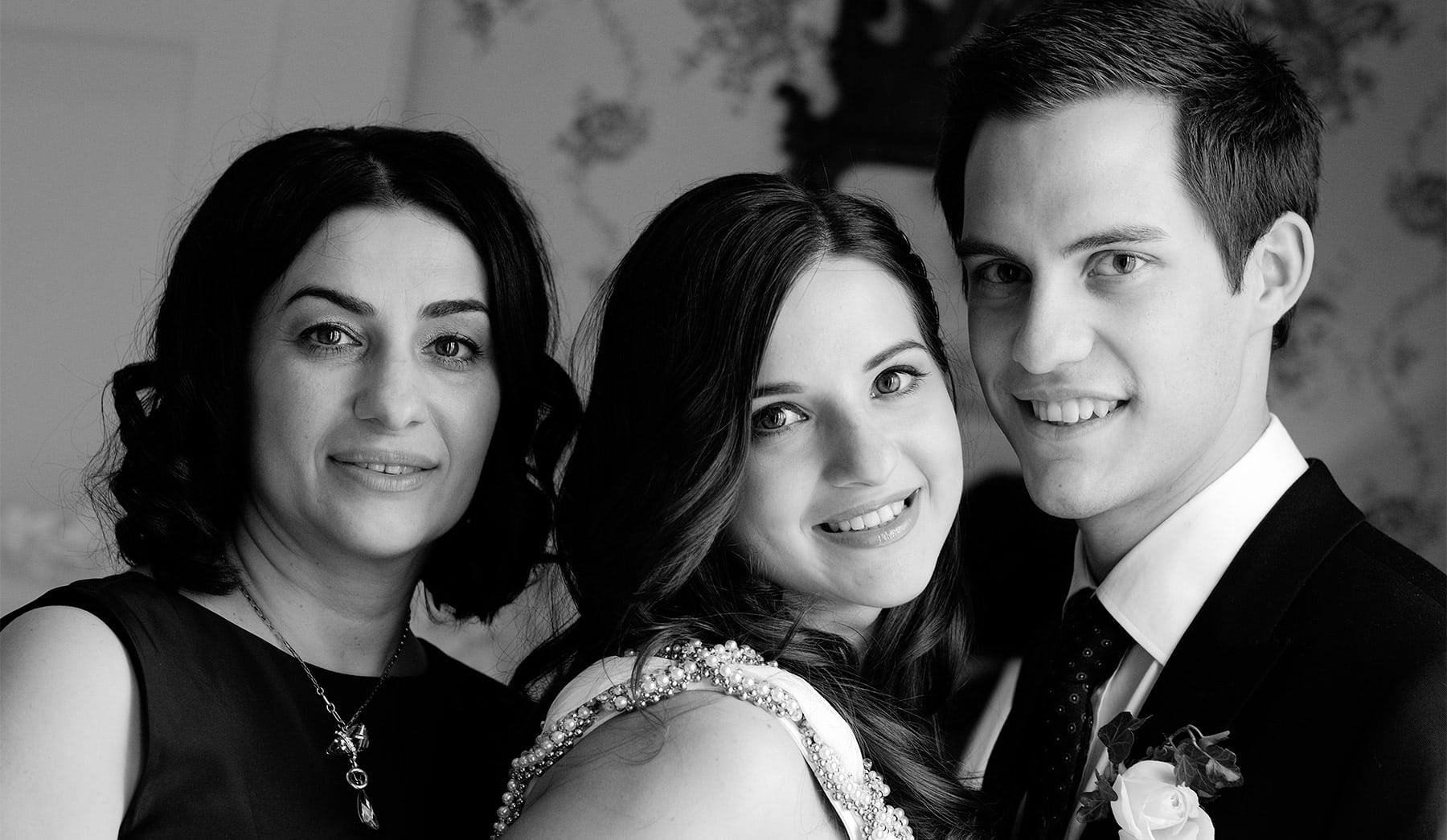 Bride photographed with her mother after a London register office wedding