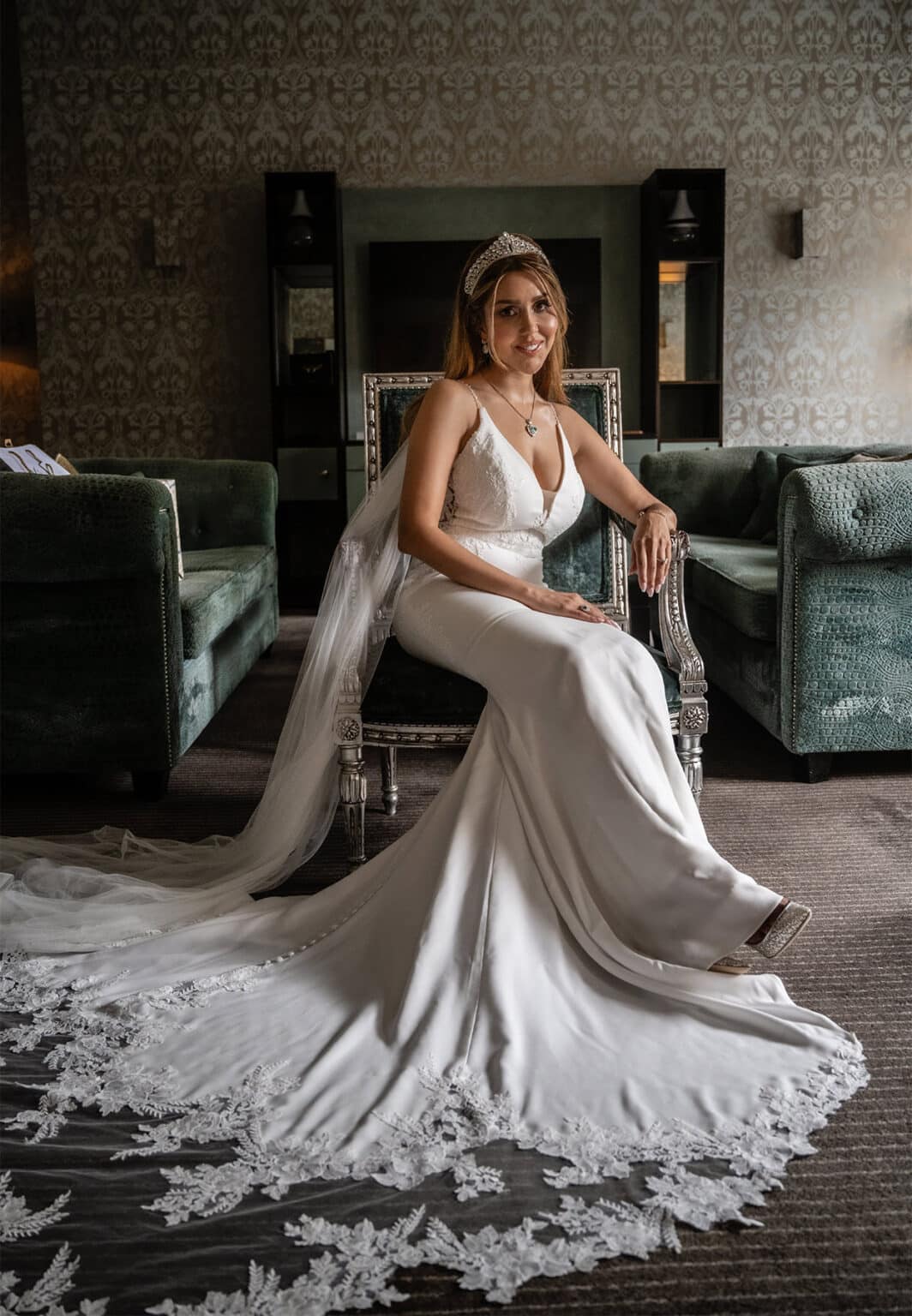 Bride seated with her long train at Home House, London