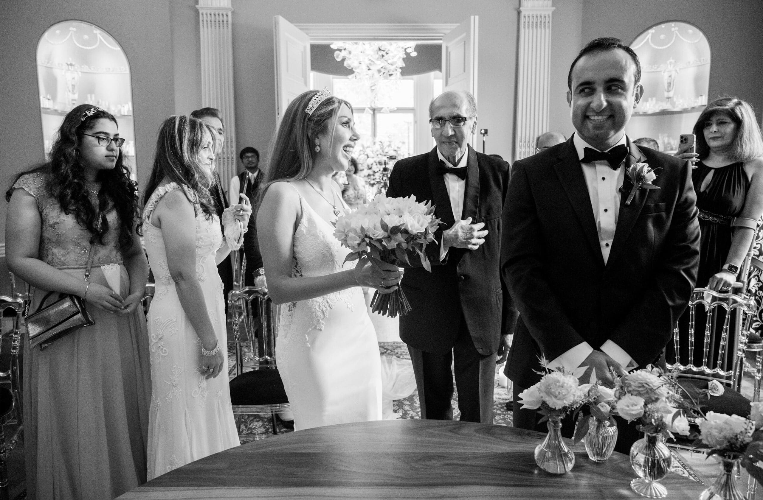 Black and white photograph of a Persian bride and groom during their ceremony at Home House, London