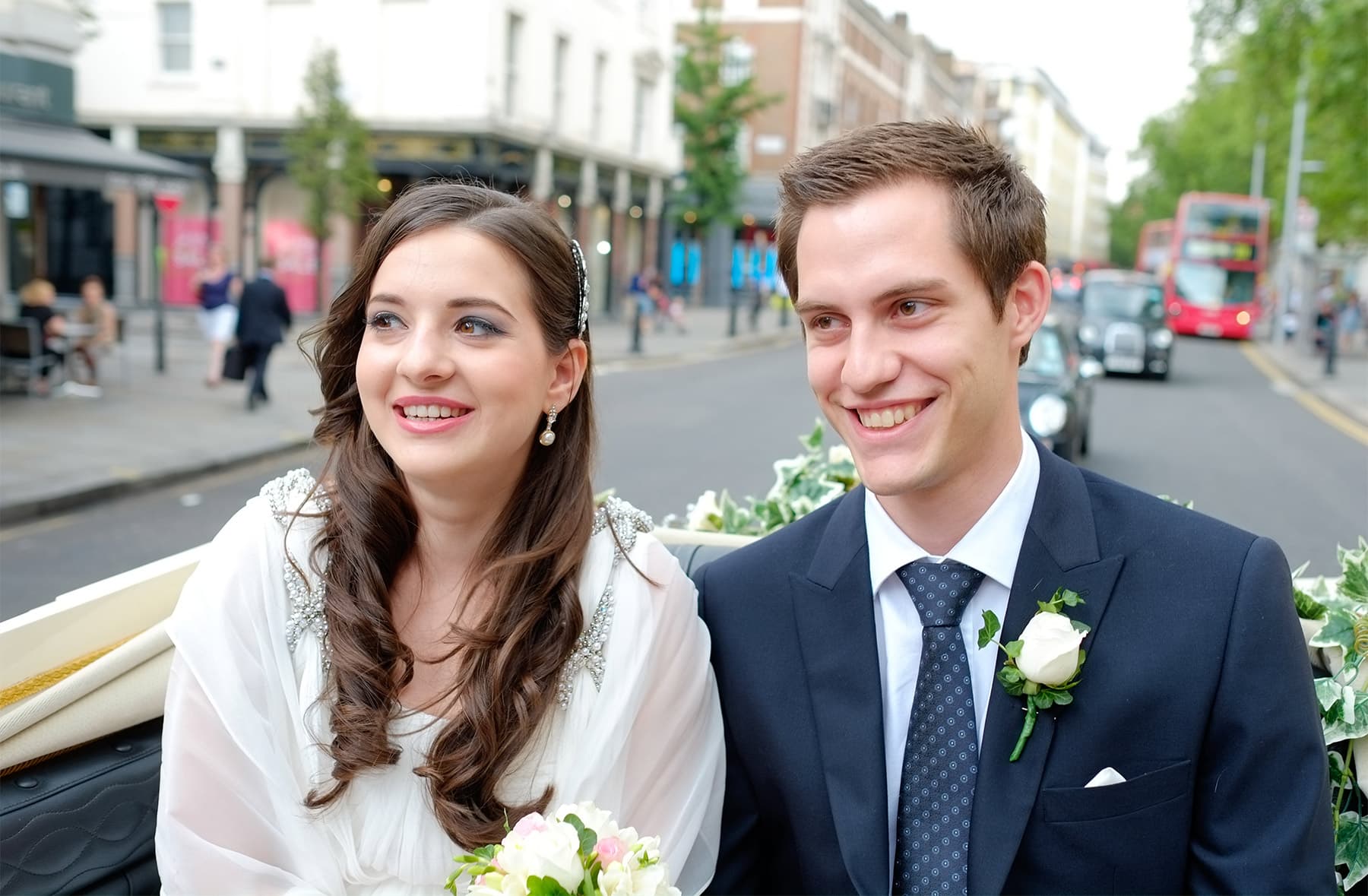 Bride and groom outside Chelsea Old Town Hall after their wedding ceremony