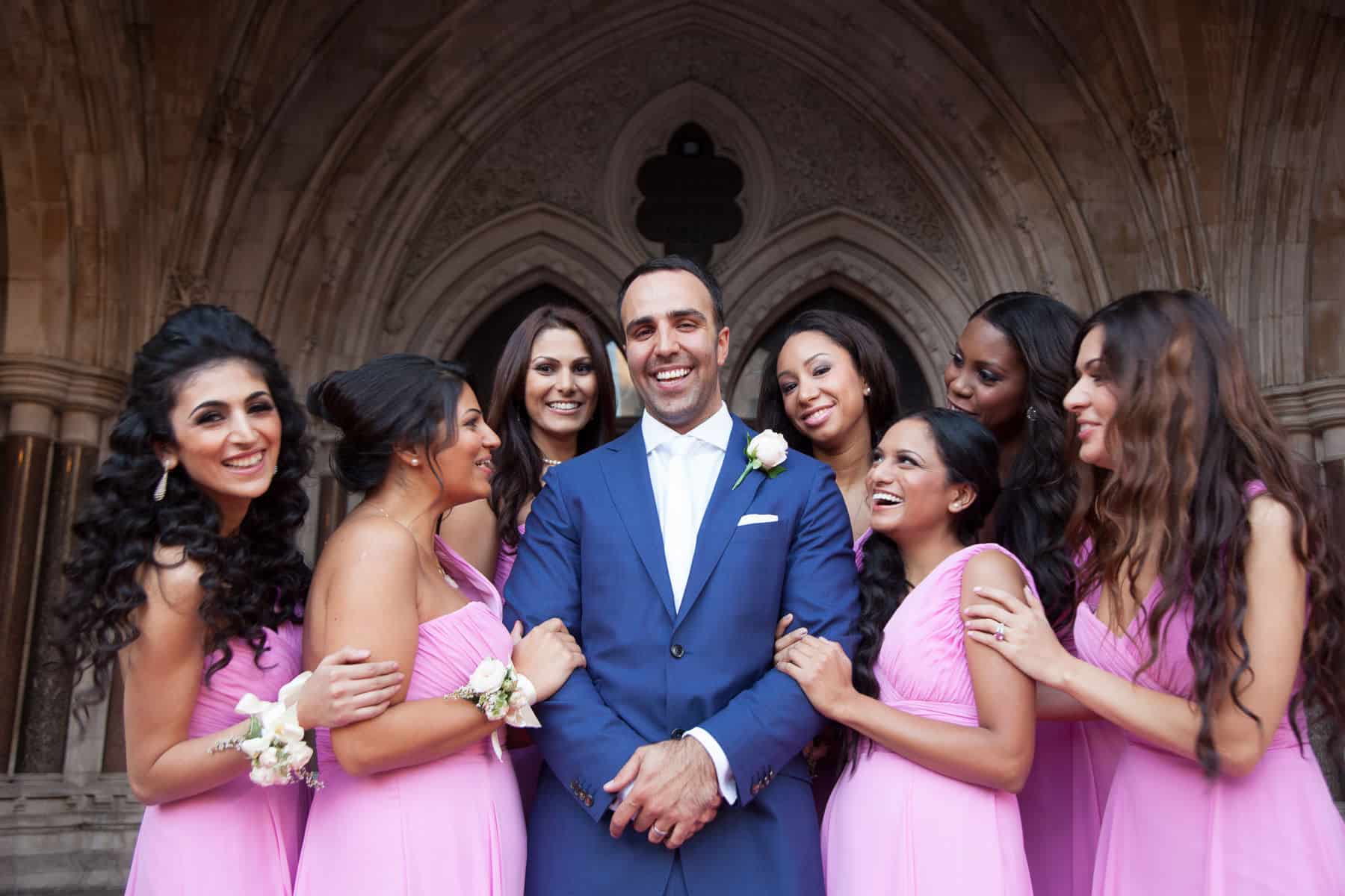 Navid and Roujin on their wedding day at the Royal Courts of Justice, London