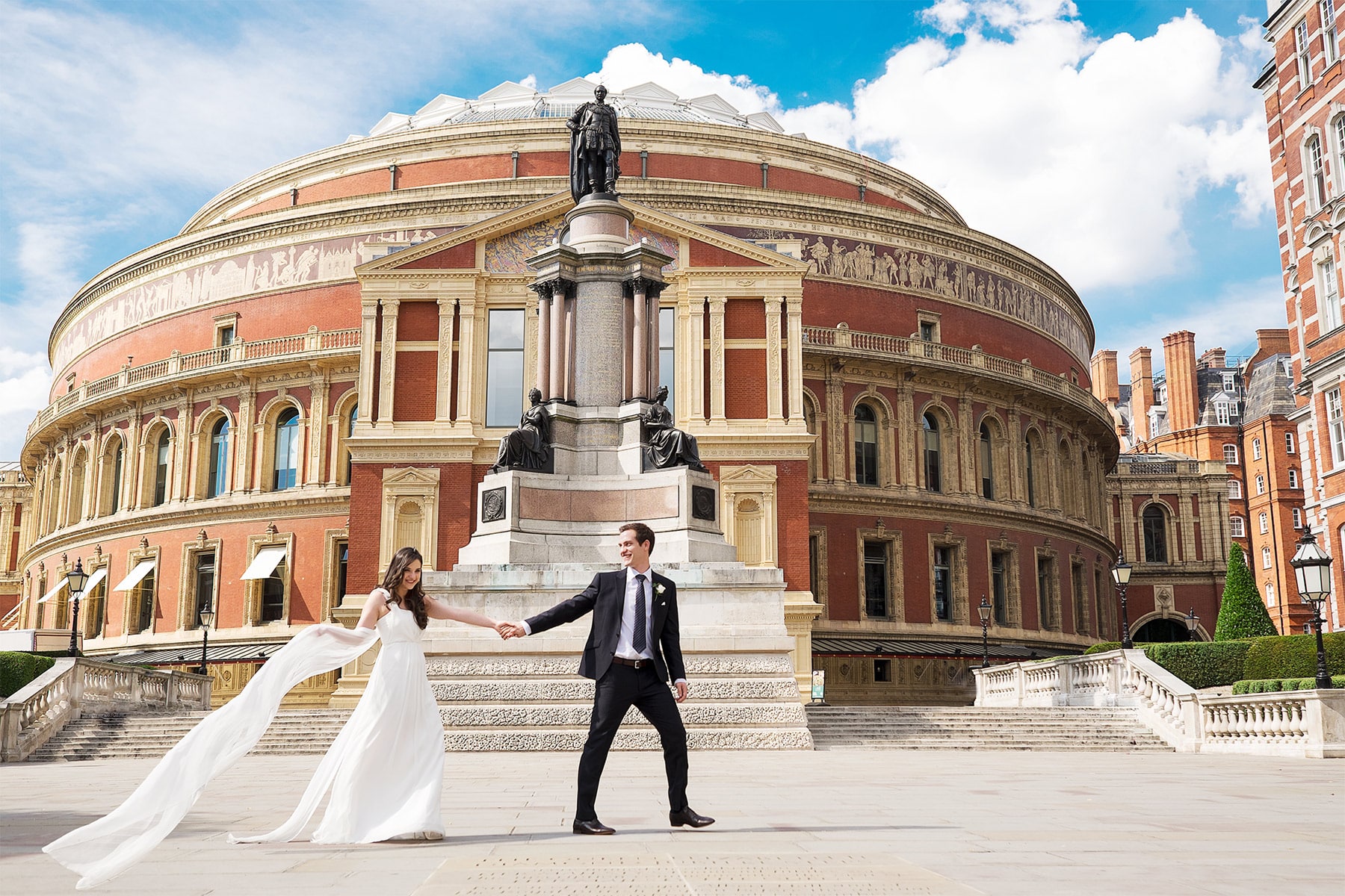 Bride and groom outside the Royal Albert Hall in London