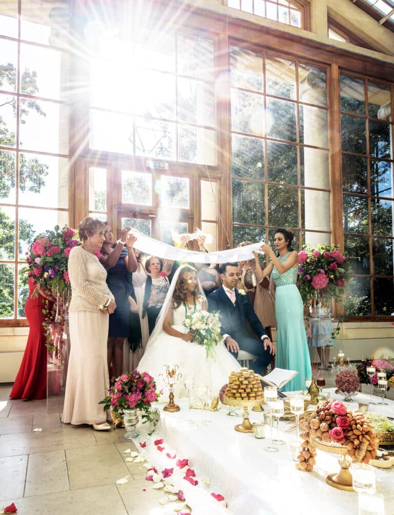 Wedding ceremony inside a Victorian glasshouse at Kew Gardens