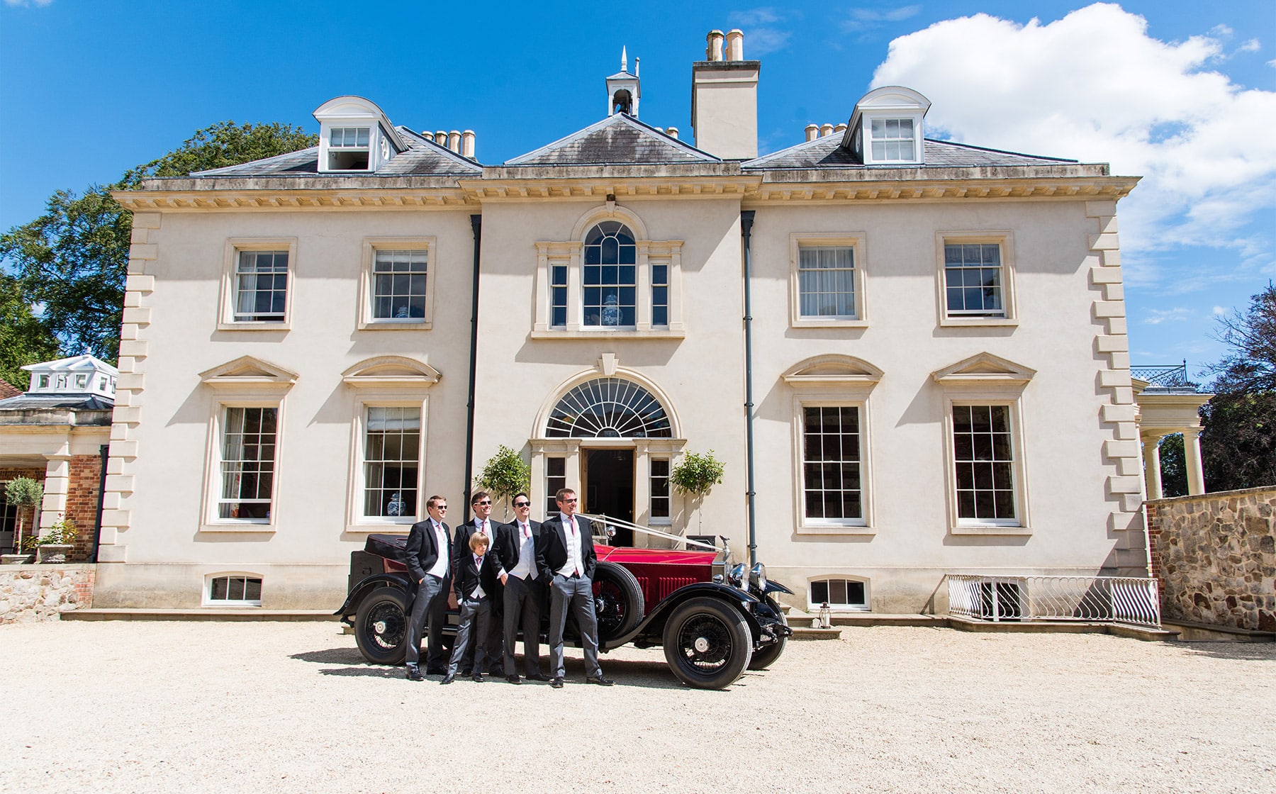 rockely-manor-wedding-rolls-royce-and-groomsmen