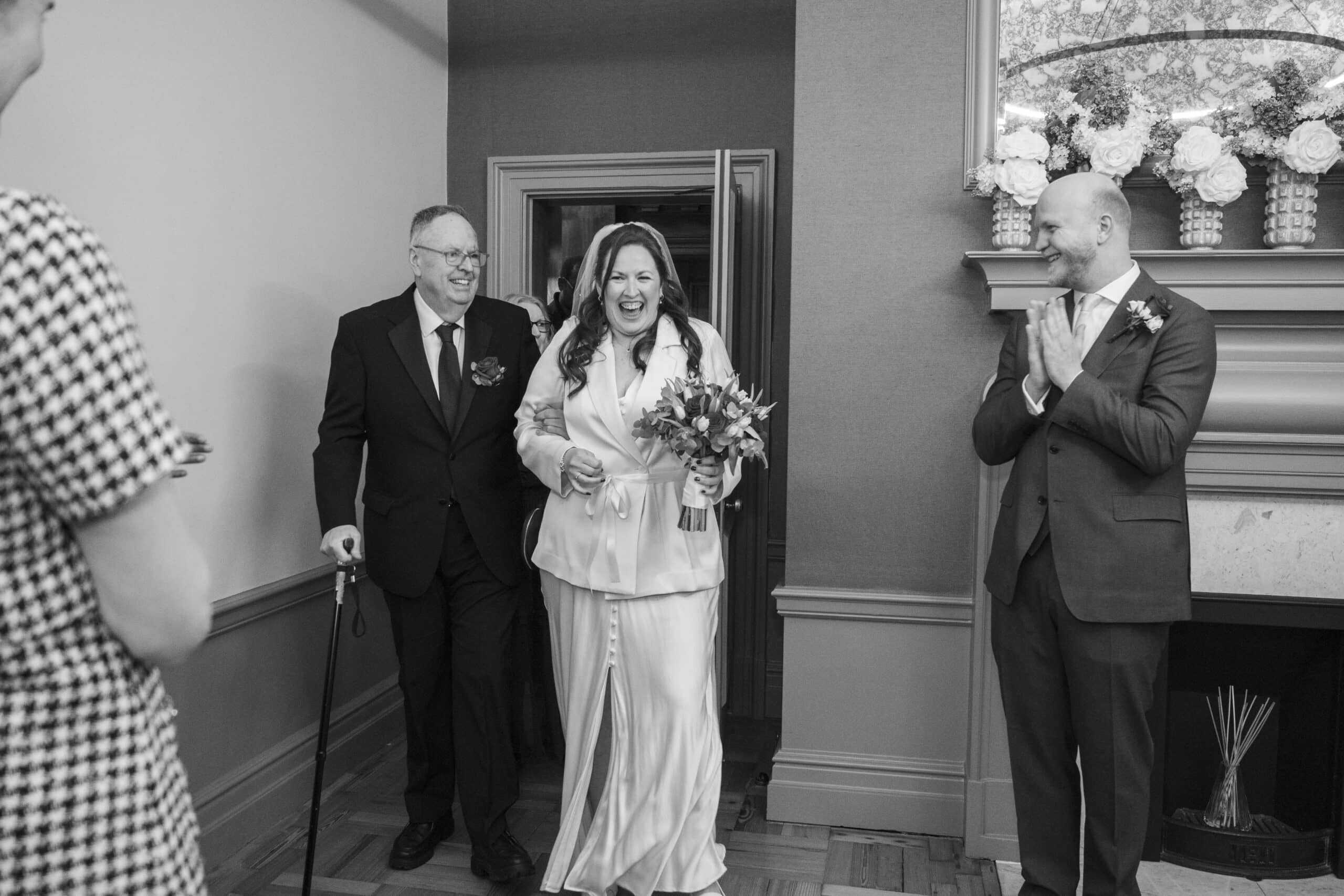 bride and father entrance Marylebone Town Hall wedding