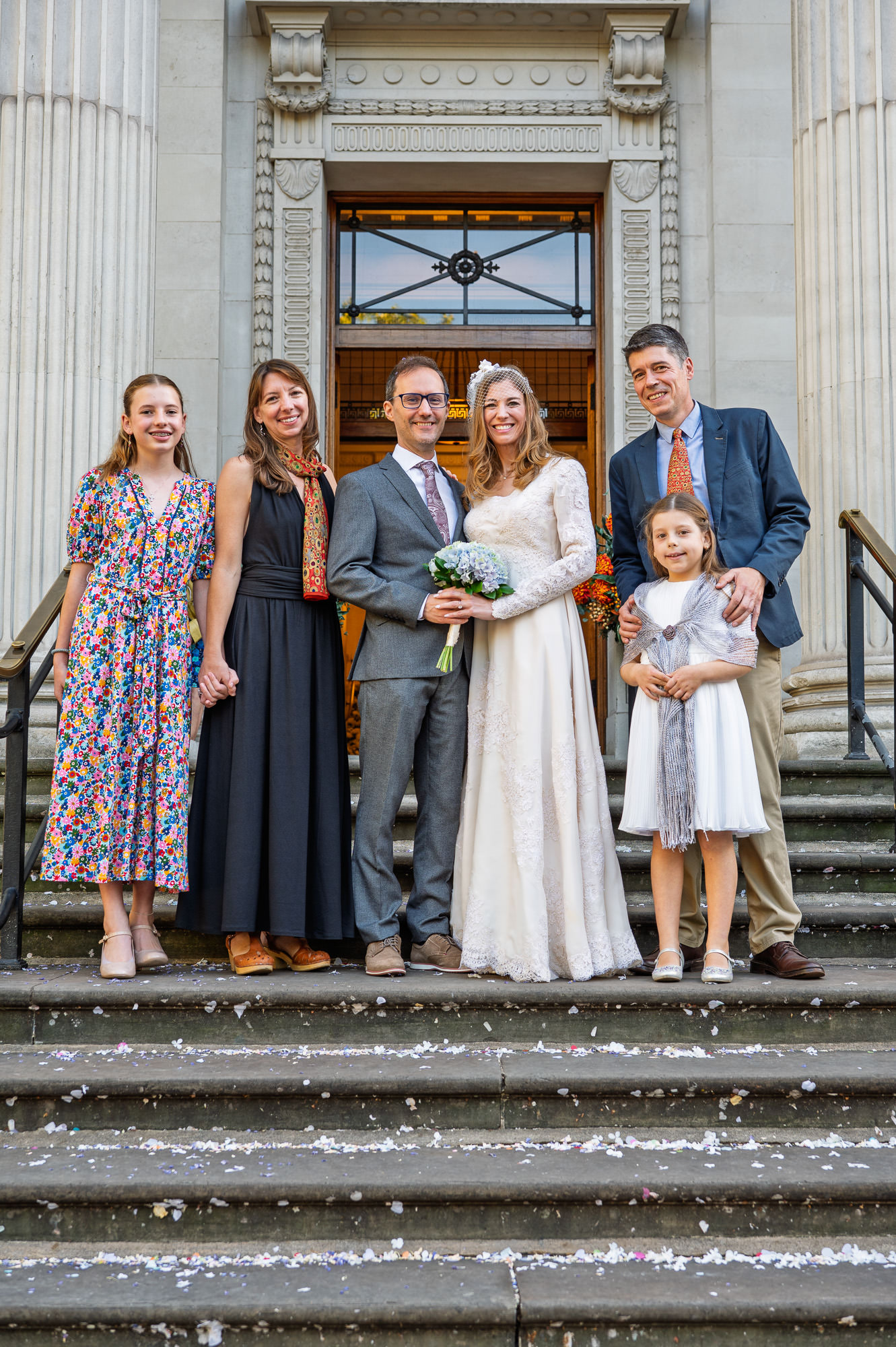 Family group photo on the steps of Old Marylebone Town Hall after the ceremony