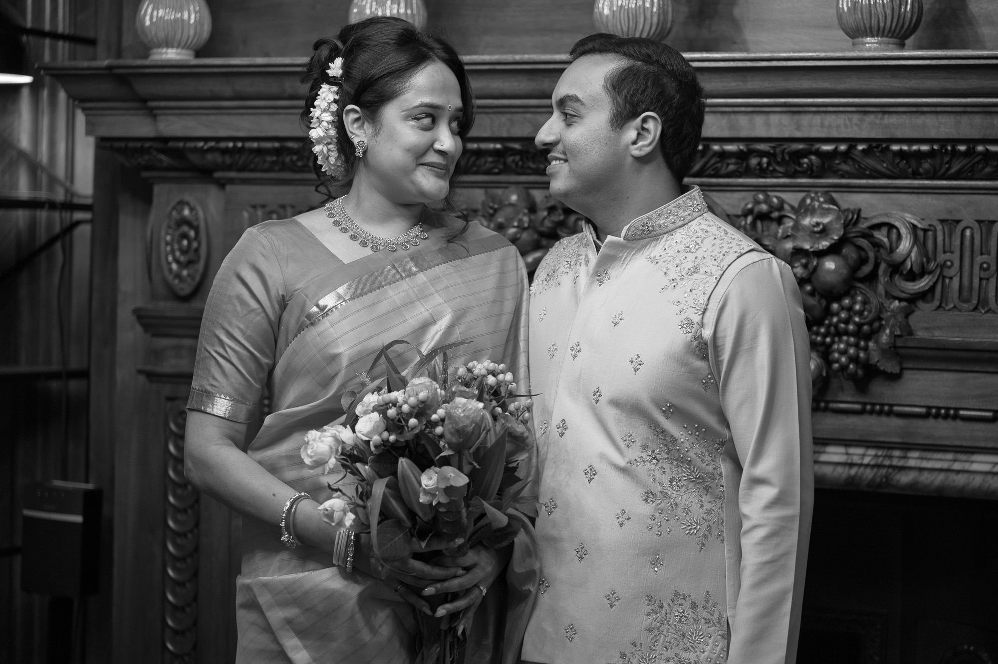 Black and white portrait of the bride and groom in the Paddington Room