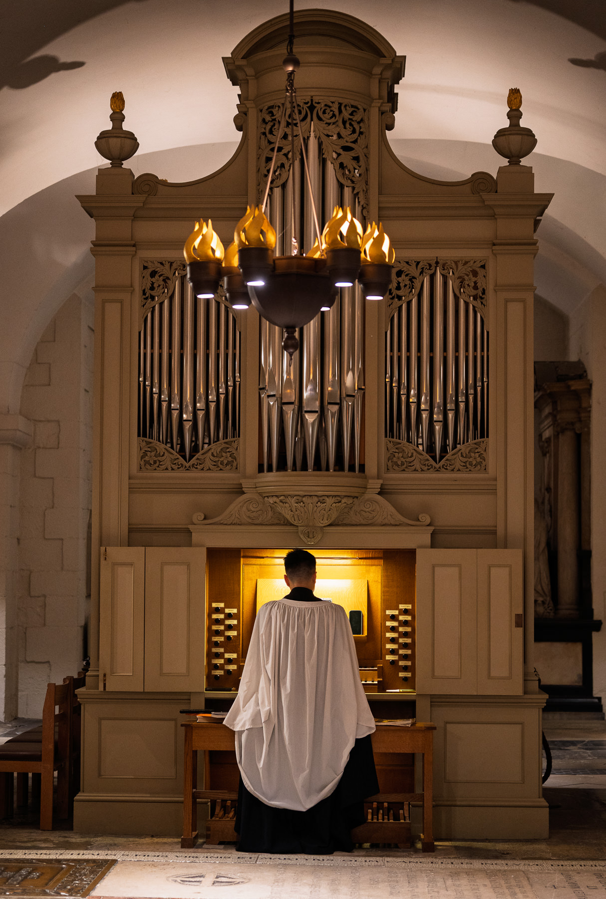 The organist playing before the christening at St Paul's Cathedral