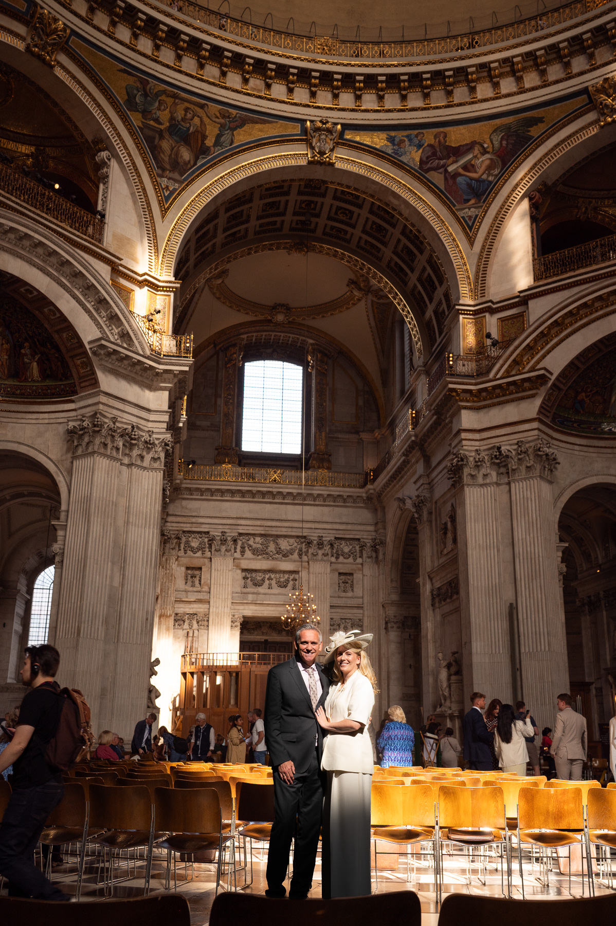 Jane and Jason under the dome inside St Paul's Cathedral after the christening