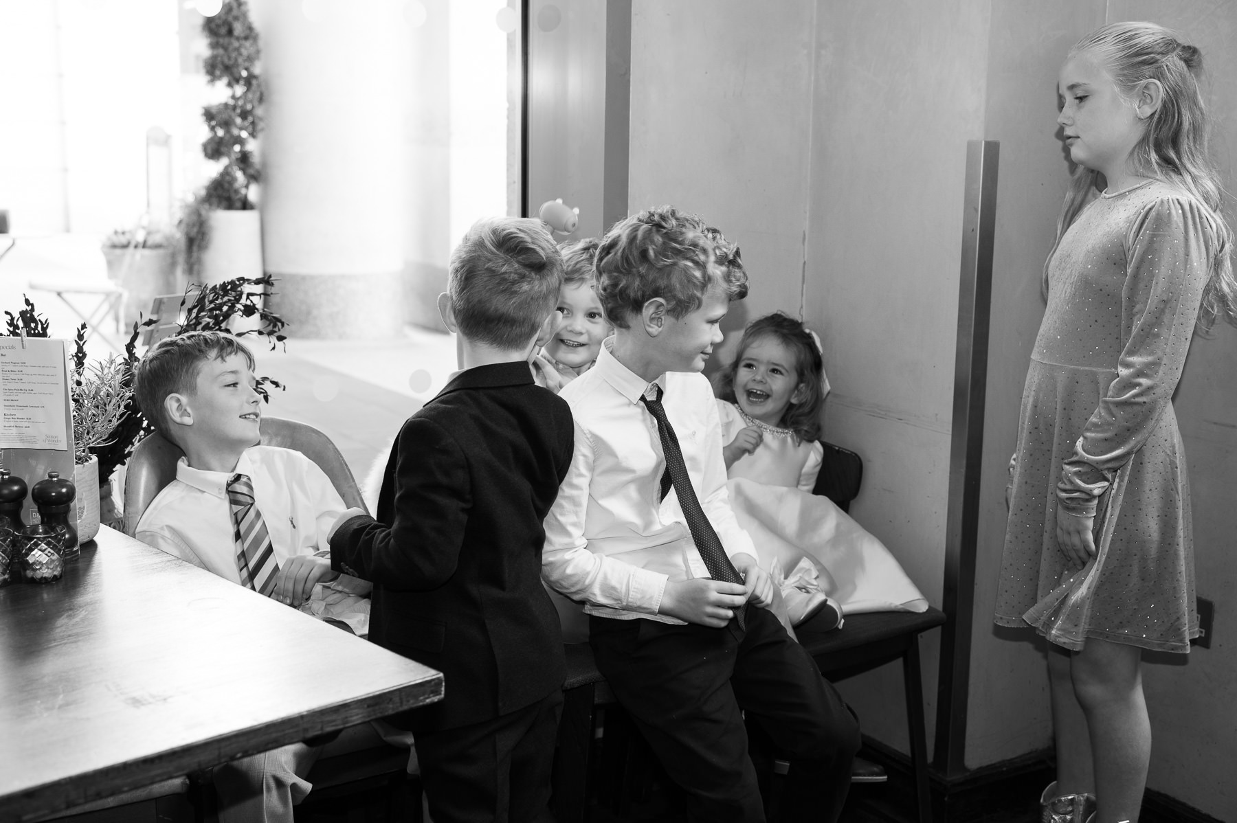 Black and white photo of children at Happenstance near St Paul's after the christening