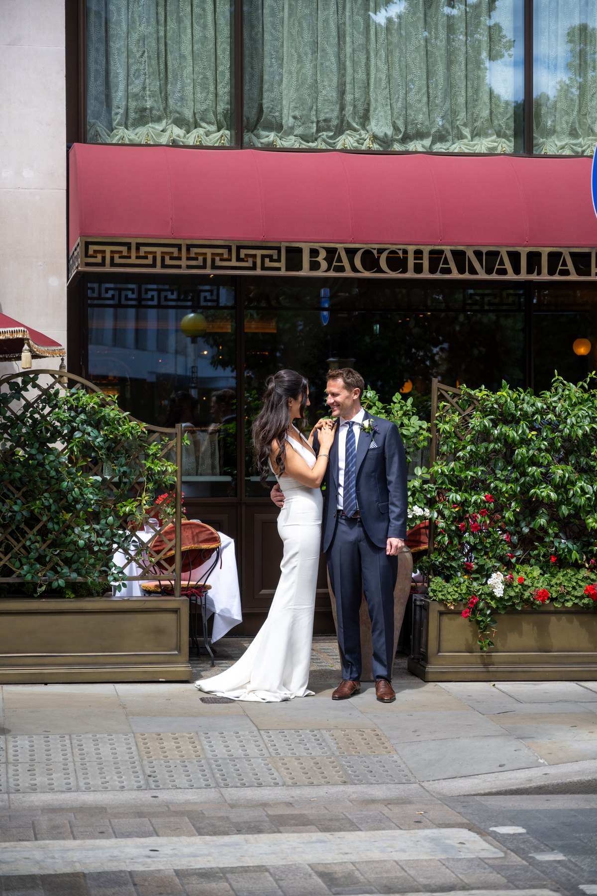 Sam and Matt standing outside Bacchanalia on Mount Street in Mayfair
